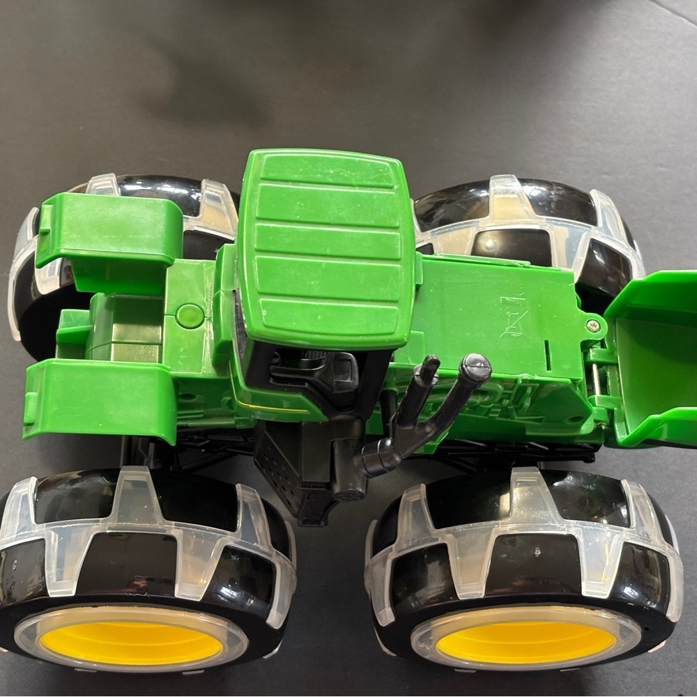 John Deere tractor with light up wheels. Like new condition. - Picture 5 of 6